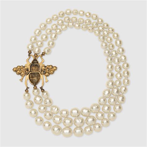 gucci bee jewelry ads|Bee Necklace With Pearl In Aged Gold Metal .